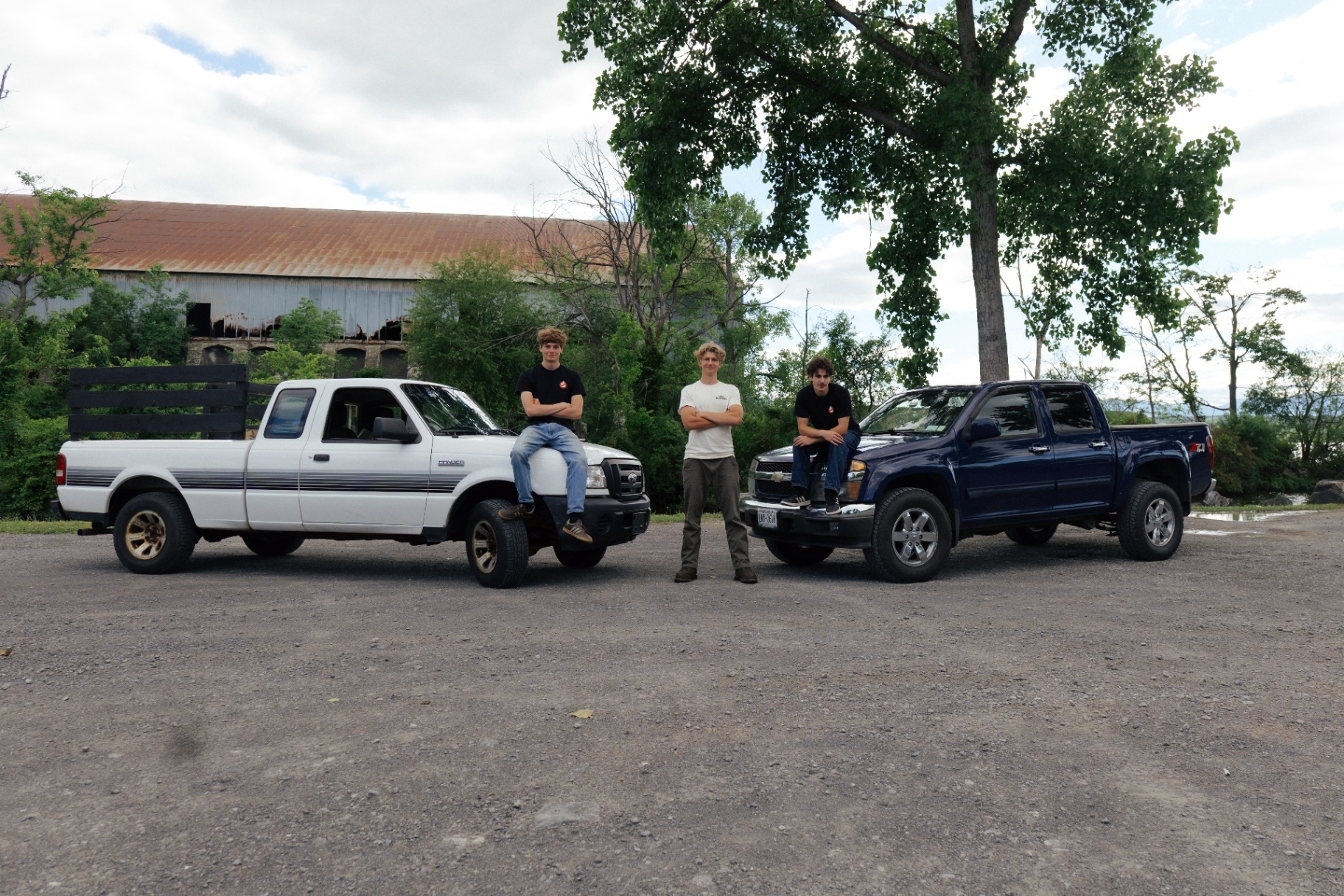The Junk Busters team with their trucks